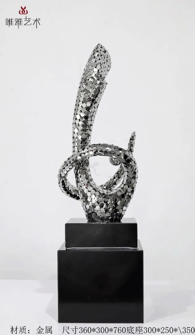Existing Weiya catalogue photo of a narrow textured metal sculpture on a dark pedestal