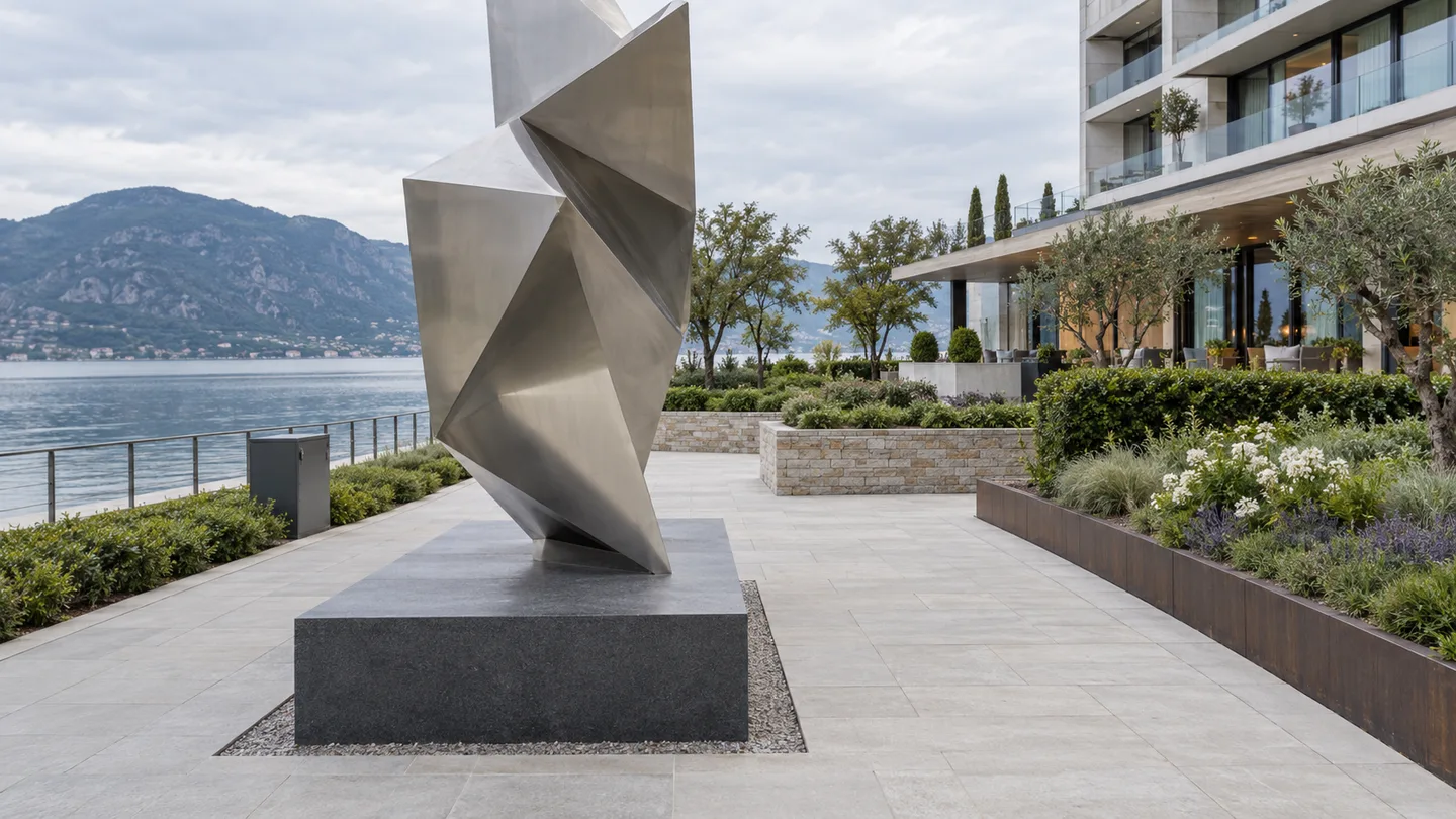 AI concept of a sculpture beside a clear service walkway and a planted coastal hotel terrace