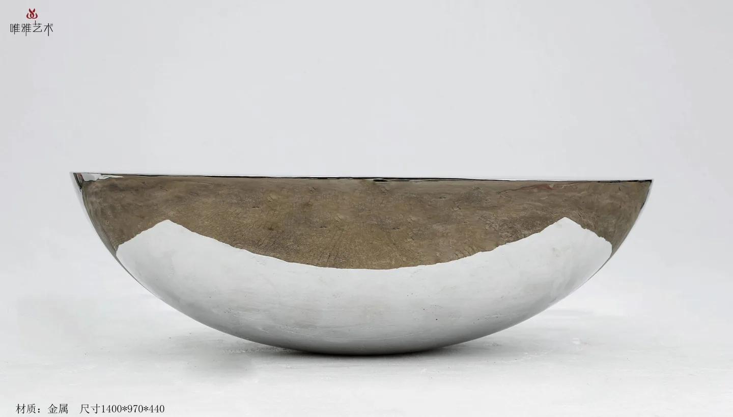 Existing Weiya catalogue photograph of a bowl-like metal form with a broad recessed surface