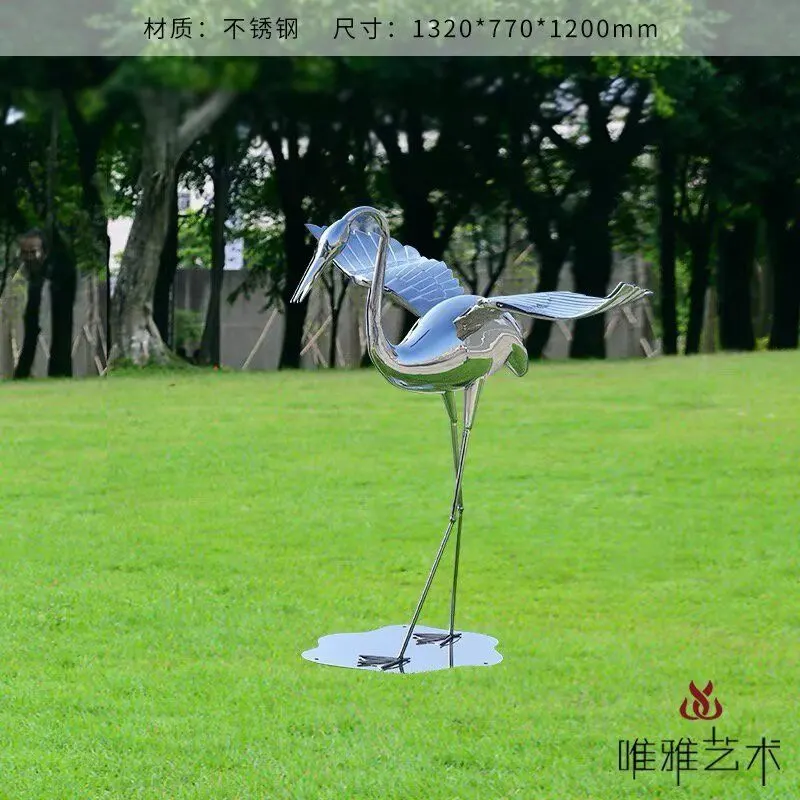 Polished metal sculpture in an outdoor public setting
