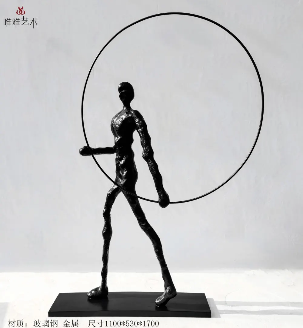 Cast metal alloy figure sculpture with polished finish