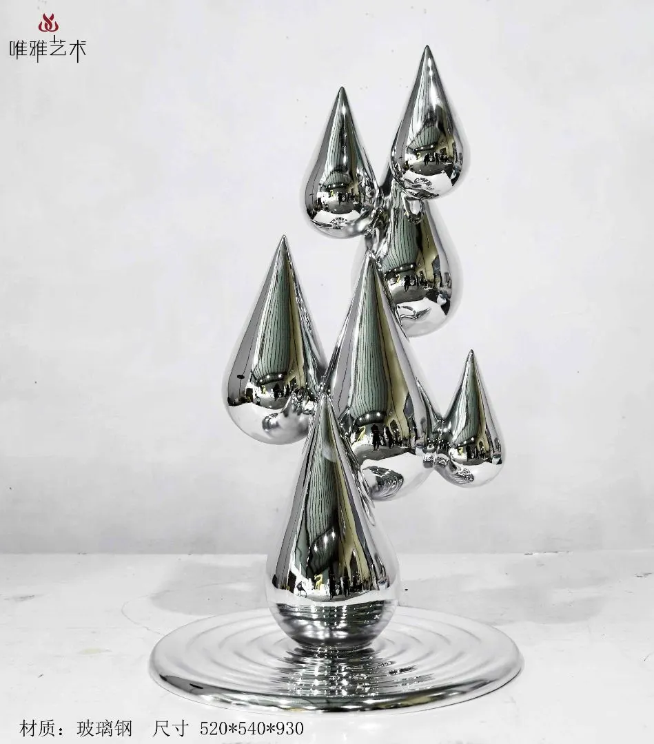 Mirror chrome electroplated abstract sculpture reflecting its surroundings